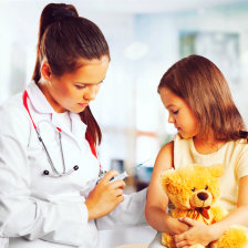 nurse doing immunization on a child